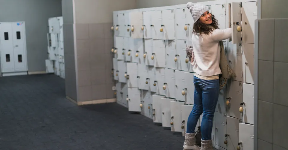 woman using a smart locker lock